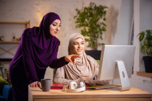 Happy muslim woman at home during online lesson. technologies, remote education, ethnicity concept